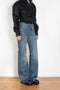 The 4PKT Straight Leg Denim by Coperni is a mid rise jeans with a fitted upper, 4 pockets and a straight leg