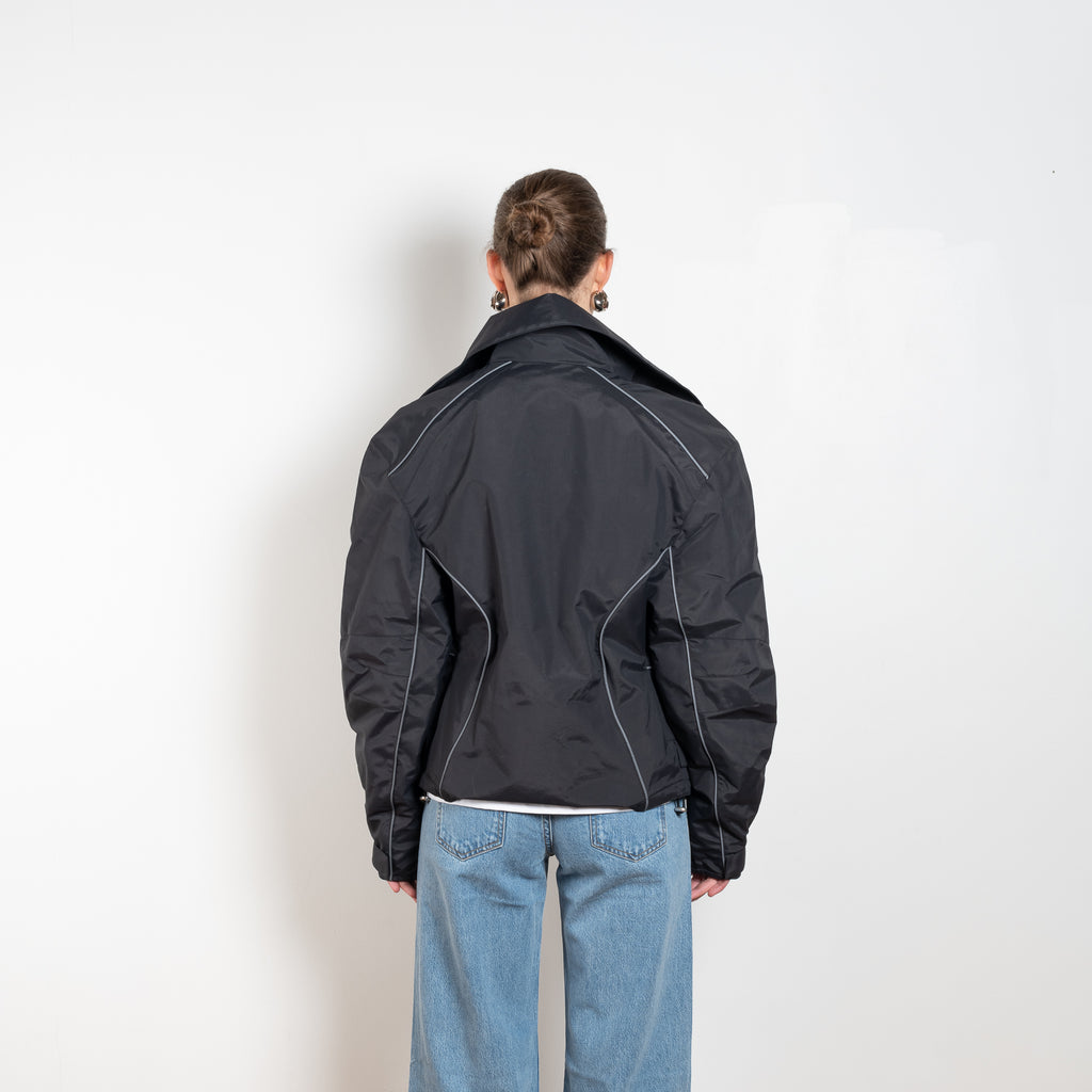 The Body Jacket by Coperni is a technical biker inspired jacket with body details