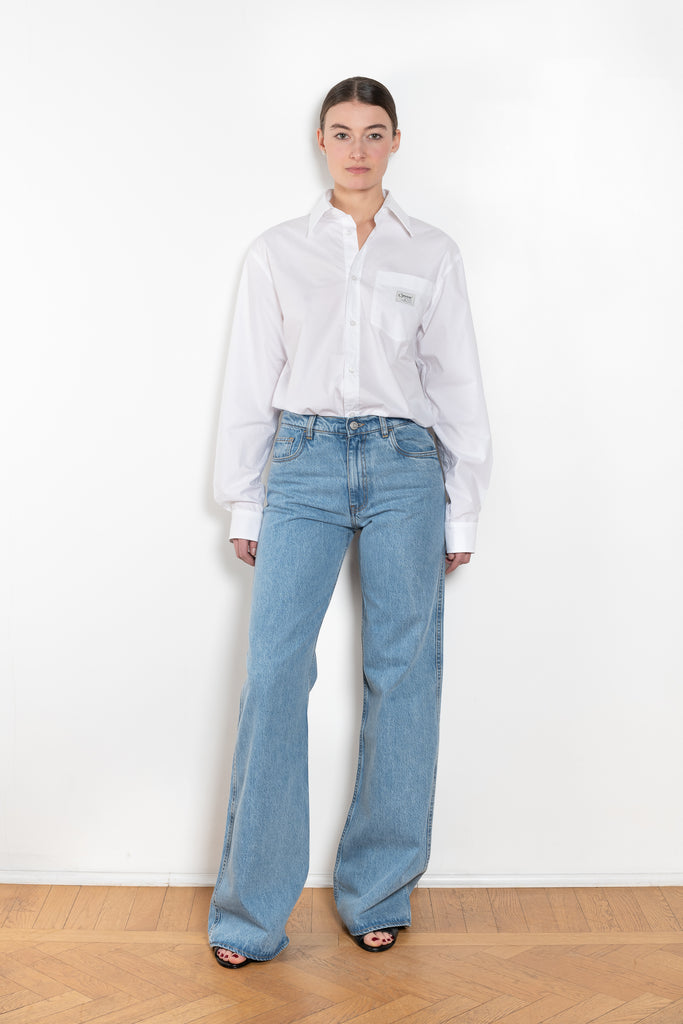 The Body Poplin Shirt by Coperni is a crisp cotton shirt with logo patch and body details