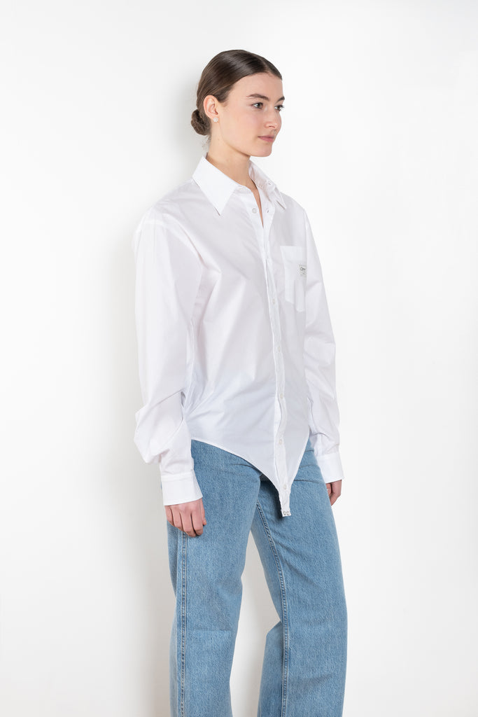 The Body Poplin Shirt by Coperni is a crisp cotton shirt with logo patch and body details