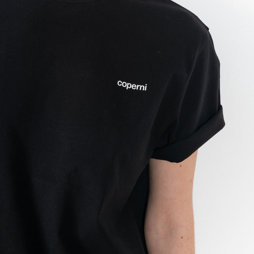 The Logo Boxy T-Shirt by Coperni is a signature relaxed Tee with a small slanted Coperni Logo on the front