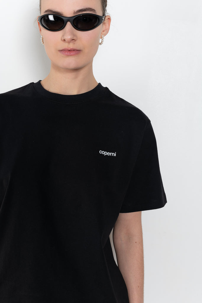 The Logo Boxy T-Shirt by Coperni is a signature relaxed Tee with a small slanted Coperni Logo on the front