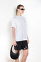 The Logo Boxy T-Shirt by Coperni is a signature relaxed Tee with a small slanted Coperni Logo on the front