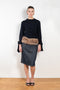 The Faux Fur Hybrid Denim Skirt by Coperni is a denim skirt with an optic low waist and faux fur waistband at the front