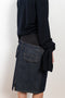 The Faux Fur Hybrid Denim Skirt by Coperni is a denim skirt with an optic low waist and faux fur waistband at the front