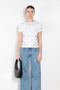 The Petal Embroidered Tshirt by Coperni is a fitted Tee with a small Coperni logo and seasonal petal cut-outs