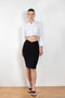 The Triangle Skirt by Coperni is a low waist fine jersey skirt with a small Logo at the te front and a triangle cut-out at the back