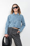 The Workwear Denim Jacket by Coperni is a cropped denim jacket with a zip closure and minimal details