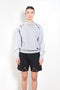 The Petal Embroidered Sweater by Coperni is a relaxed sweater with a small Coperni logo and seasonal petal cut-outs