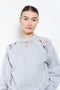 The Petal Embroidered Sweater by Coperni is a relaxed sweater with a small Coperni logo and seasonal petal cut-outs