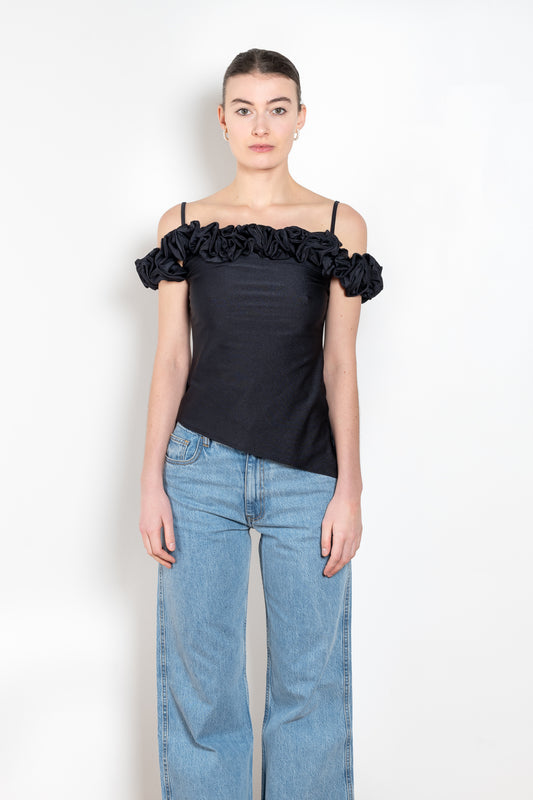 The Ruffle Top by Coperni is a fitted off-the-shoulder top with a ruffle neckline