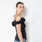 The Ruffle Top by Coperni is a fitted off-the-shoulder top with a ruffle neckline