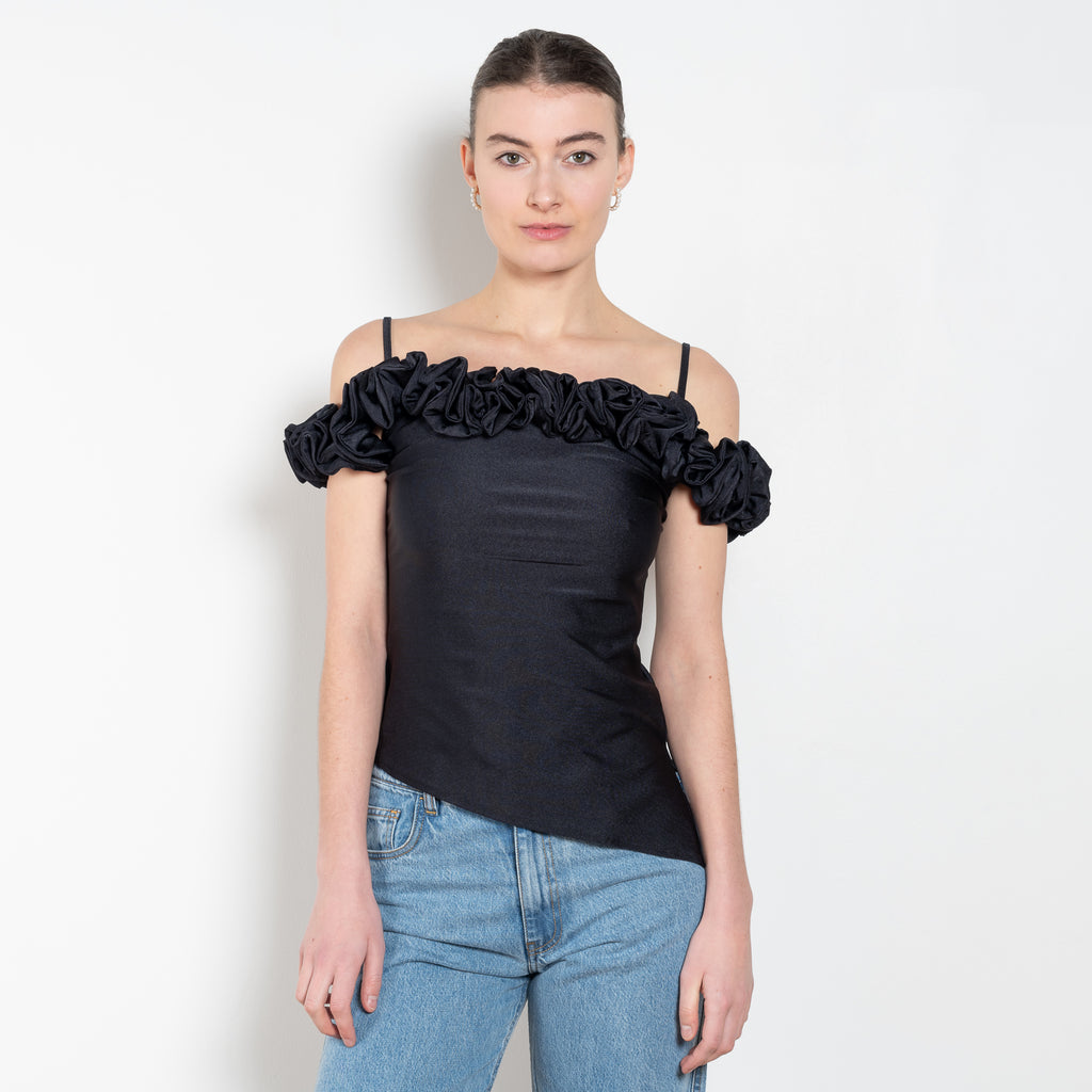 The Ruffle Top by Coperni is a fitted off-the-shoulder top with a ruffle neckline