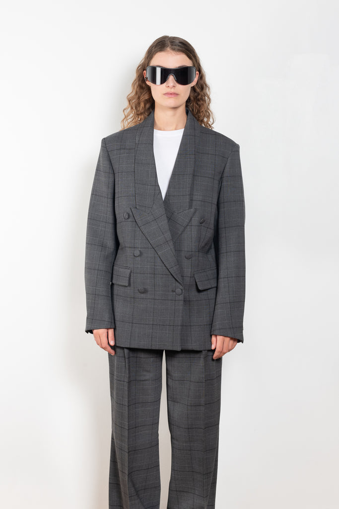 The Tailored Jacket by Coperni is a double breasted jacket with a relaxed fit in a seasonal windowpane check