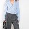 The Tailored Trouser by Coperni is a mid rise trouser with a long fluid wide leg in a seasonal windowpane check