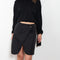 The Wraparound Skirt by Coperni is mid length wrap skirt with front slit with a Logo Hardware closure