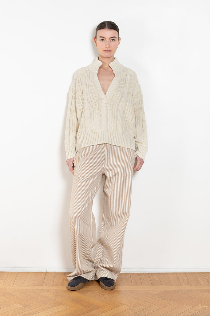 The Split Neck Cable Sweater By Denimist is a relaxed cable knit sweater in a soft cotton