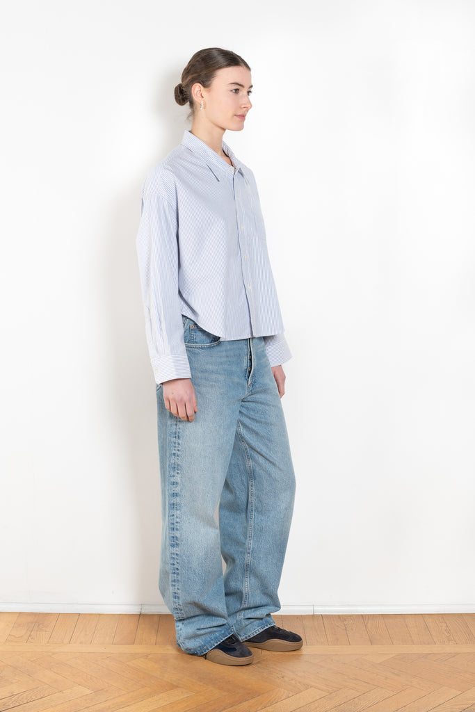 The Cropped Shirt By Denimist is a boxy loose cotton button up shirt with a blue stripe