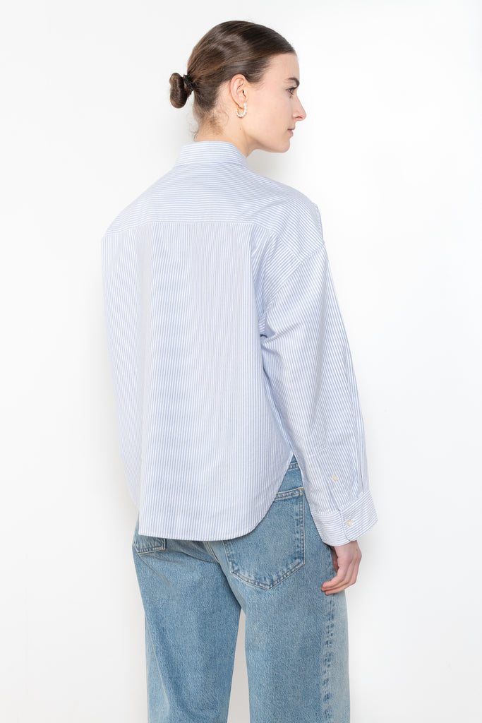 The Cropped Shirt By Denimist is a boxy loose cotton button up shirt with a blue stripe