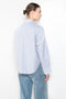 The Cropped Shirt By Denimist is a boxy loose cotton button up shirt with a blue stripe