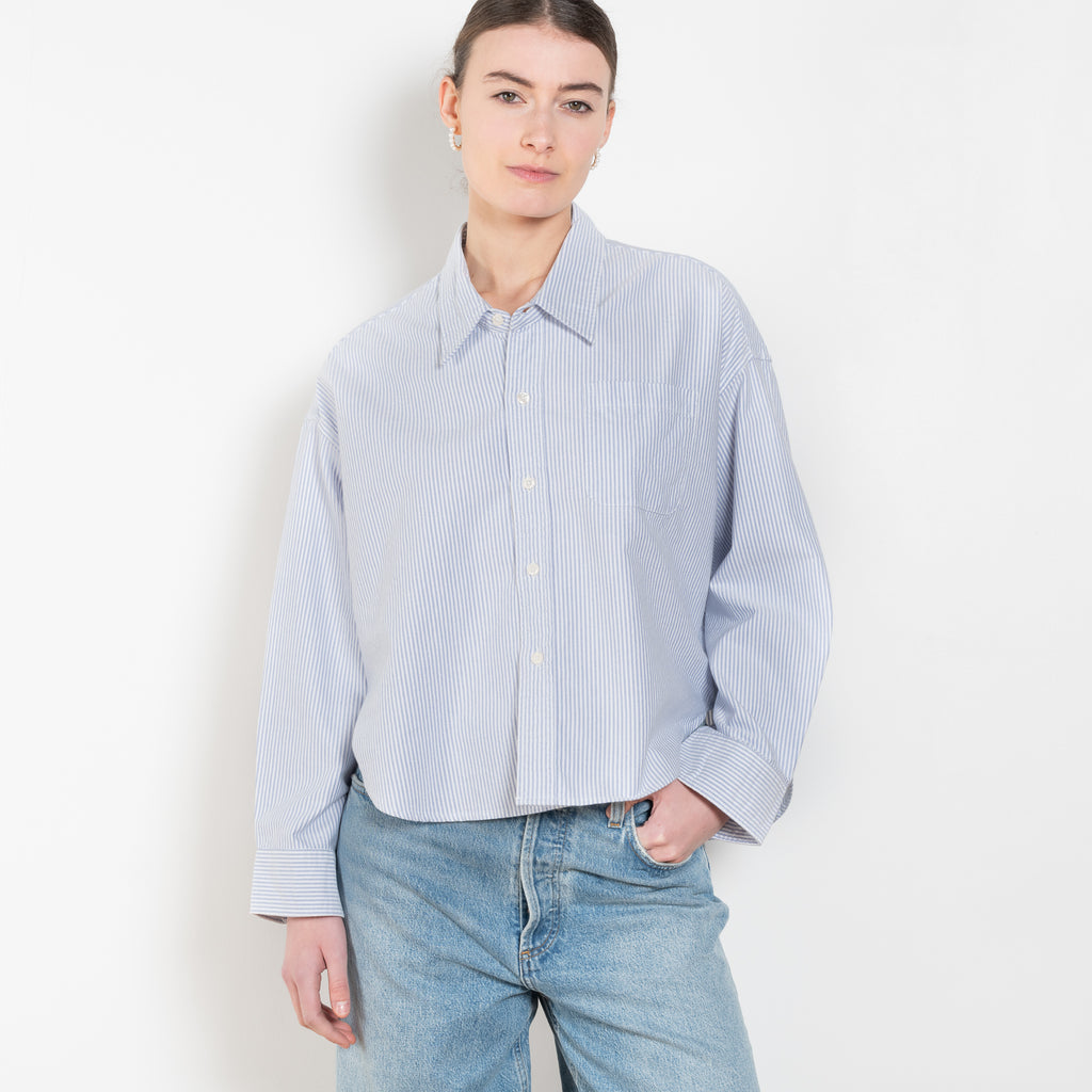 The Cropped Shirt By Denimist is a boxy loose cotton button up shirt with a blue stripe