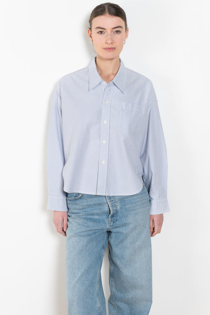 The Cropped Shirt By Denimist is a boxy loose cotton button up shirt with a blue stripe