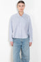 The Cropped Shirt By Denimist is a boxy loose cotton button up shirt with a blue stripe