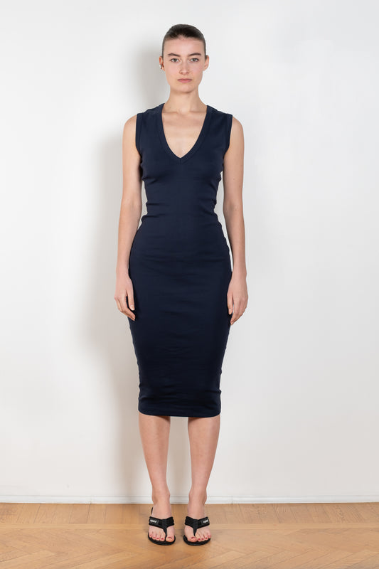 The Dewi Midi Dress by Flore Flore is a deep v-neck dress