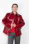 The Original Hip Lacquer Jacket by Kassl Editions is crafted from bold and striking red lacquer wool in a vibrant red color