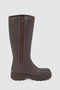 The Ilse Boot by Kassl Edtions in coffee brown&nbsp;is a high rubber boot. This extra-high boot has a line zip closure