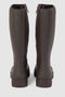 The Ilse Boot by Kassl Edtions in coffee brown is a high rubber boot. This extra-high boot has a line zip closure