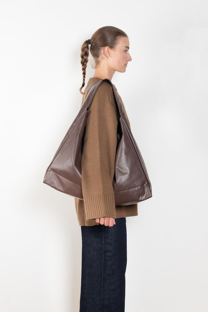 The Tote Shoulder Oil by Kassl Editions is crafted from the signature oil coated cotton-blend
