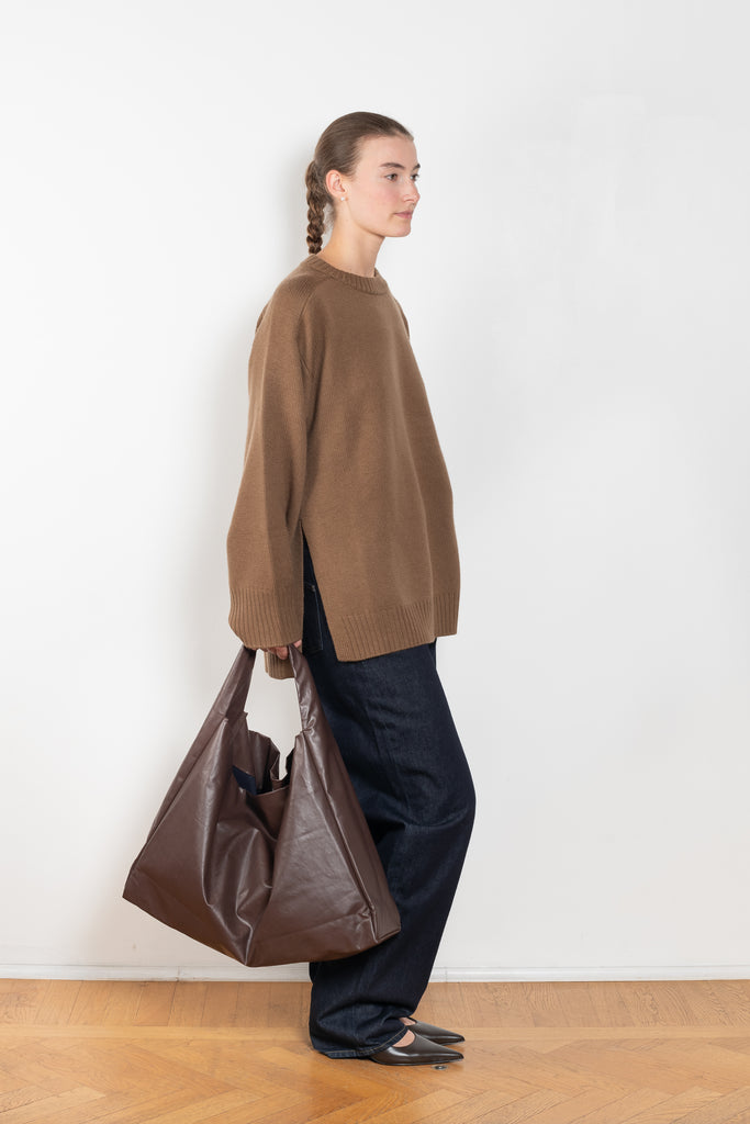 The Tote Shoulder Oil by Kassl Editions is crafted from the signature oil coated cotton-blend