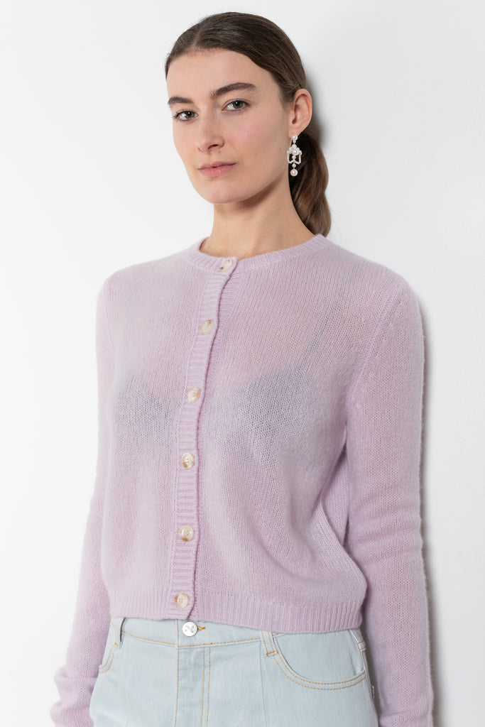 The Felicia Cardigan by Lisa Yang is a round neck cardigan with a boxy fit in a soft textured cashmere silk blend