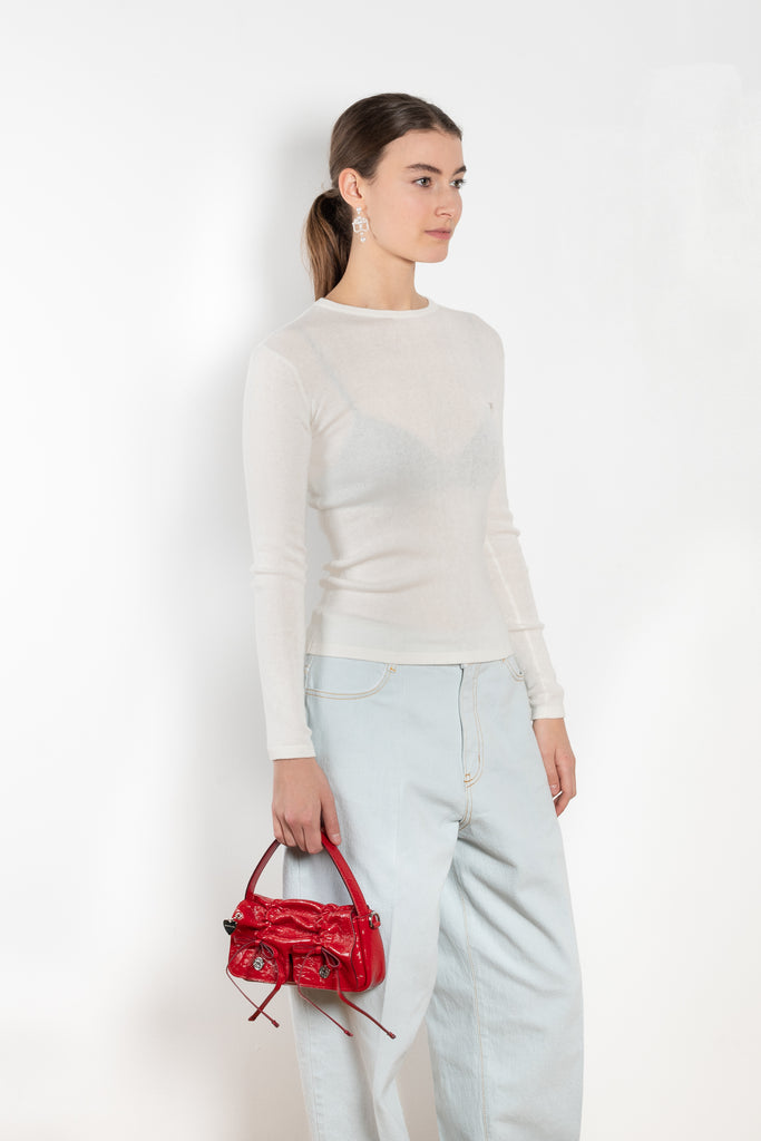 The Vivian Tee by Lisa Yang is a fitted long sleeve knit in a featherlight, fine-knit cashmere blended with cotton, and with a subtle all-over rib