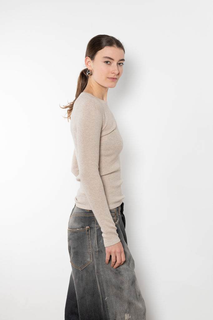 The Vivian Tee by Lisa Yang is a fitted long sleeve knit in a featherlight, fine-knit cashmere blended with cotton, and with a subtle all-over rib