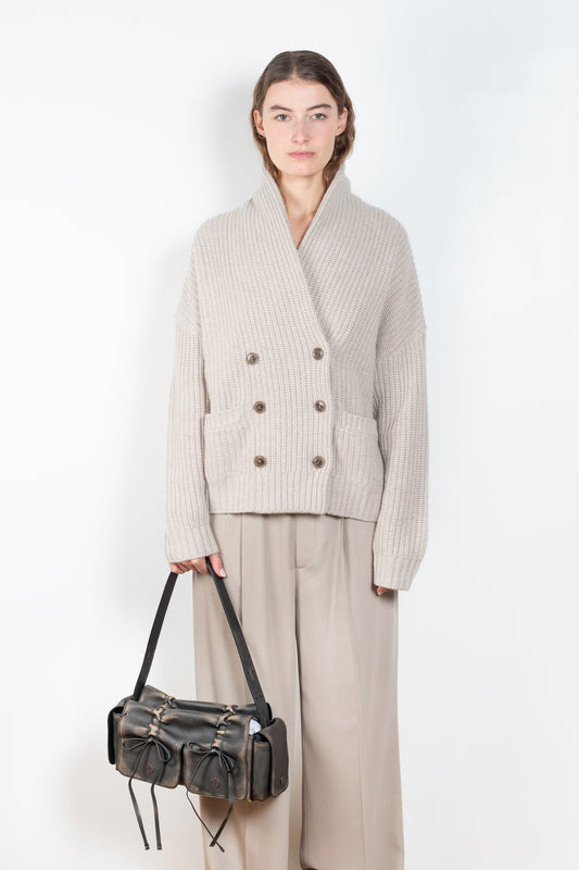 The Annalike Cardigan Jacket by Lisa Yang is a cardigan vest in a fisherman ribbed cashmere with a shawl-neck collar