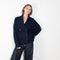 The Annalike Cardigan Jacket by Lisa Yang is a cardigan vest in a fisherman ribbed cashmere with a shawl-neck collar