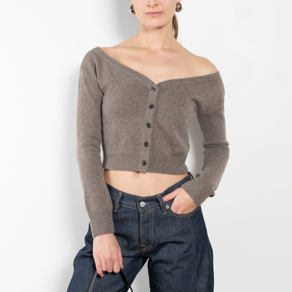 The Beata cardigan by LISA YANG is an off-the-shoulder cashmere cardigan with a cropped fitted silhouette