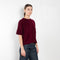 The Cila Tee by LISA YANG is a fine knit cashmere t-shirt with a classic round neck and rolled trim edges