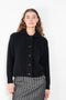 The Edda Boucle Jacketby Lisa Yang is a cardigan vest that can be worn as a jacket in a boucle cashmere