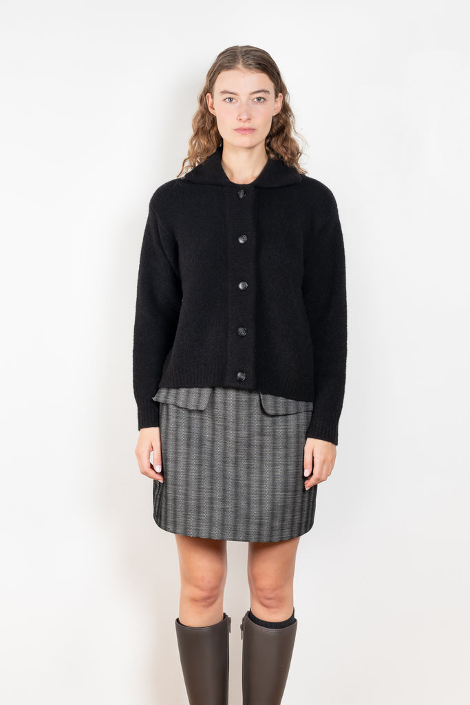 The Edda Boucle Jacketby Lisa Yang is a cardigan vest that can be worn as a jacket in a boucle cashmere