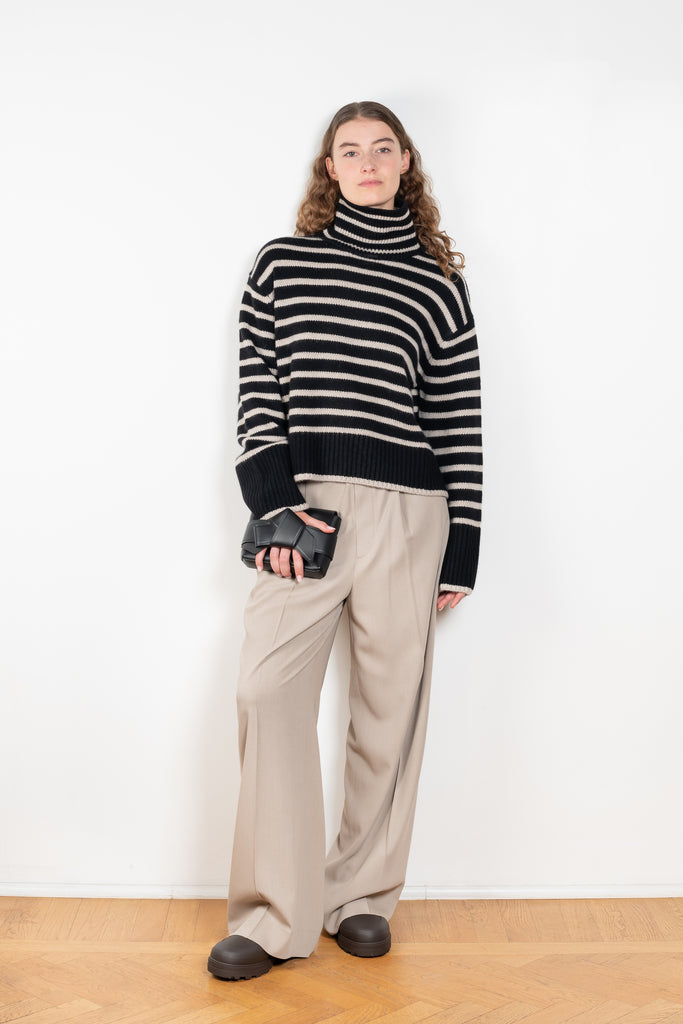 The Fleur Sweater by Lisa Yang has a relaxed silhouette with a loose high neck