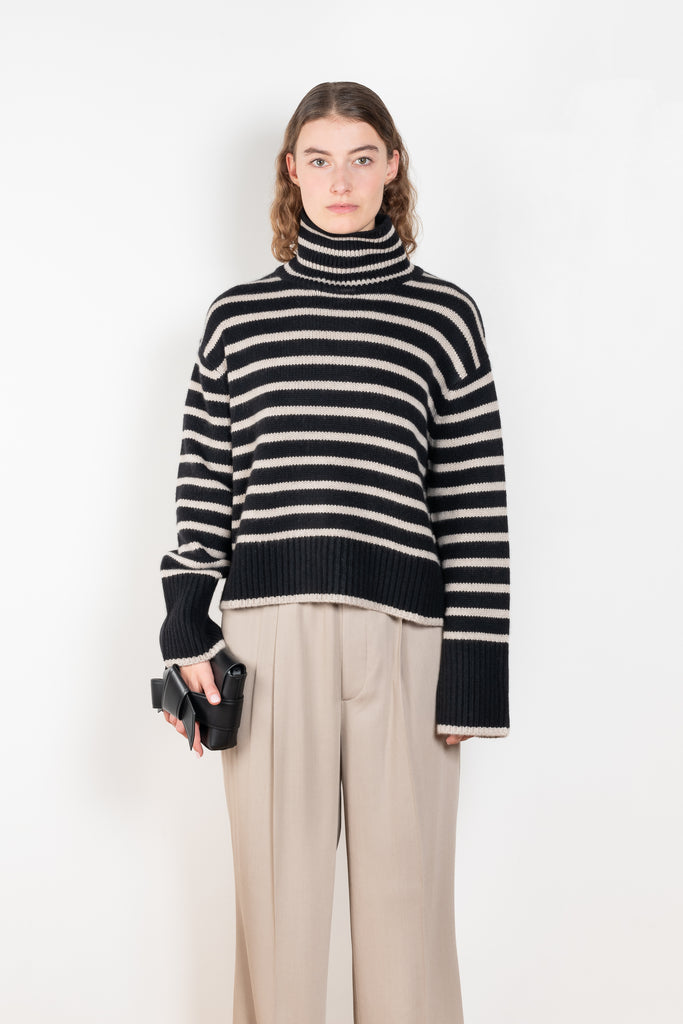 The Fleur Sweater by Lisa Yang has a relaxed silhouette with a loose high neck