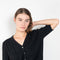 The Idun Cardigan by Lisa Yang is a 7 gauge, paddington-rib cashmere cardigan top with short sleeves