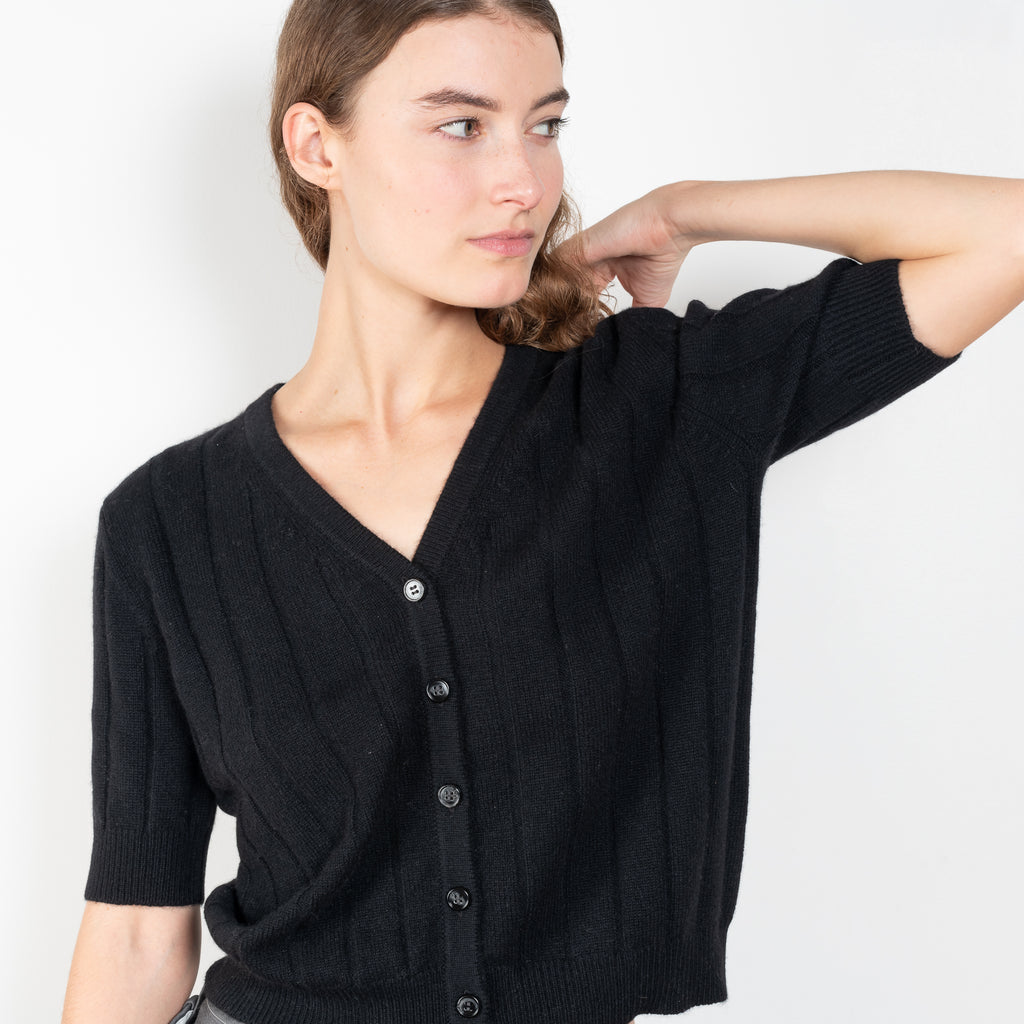 The Idun Cardigan by Lisa Yang is a 7 gauge, paddington-rib cashmere cardigan top with short sleeves