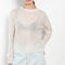 The Lova Sweater by Lisa Yang is a round neck sweater with a relaxed fit in a soft textured cashmere silk blend