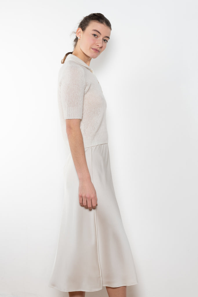 The Midi Skirt by LISA YANG in a double georgette woven silk, has a midi-length, slightly flared silhouette with an elasticated pull-on waistband