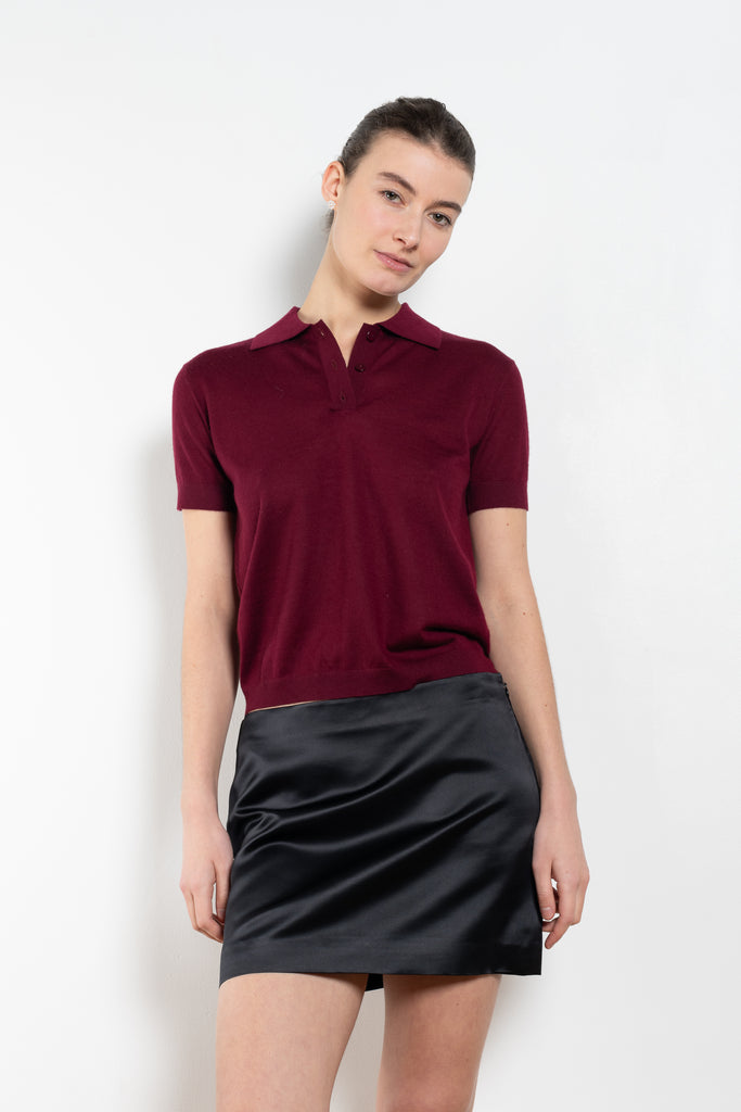 The Mini Skirt by LISA YANG in a woven heavy satin silk has a short, regular fit, is fully-lined and detailed by a hidden zip closure for a clean-line silhouette