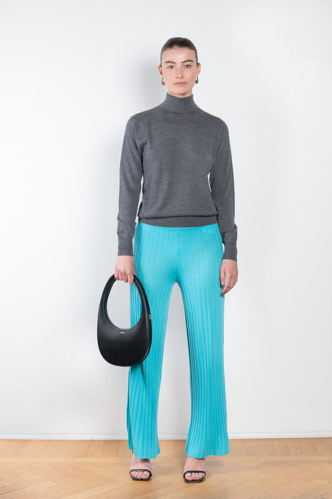 The Ophelia Sweater by Lisa Yang is a fine cashmere knit with a fitted shape and high neck